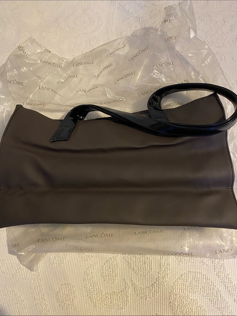 Lancome Brown Shoulder Bag with Glossy Black Handles, has been in storage